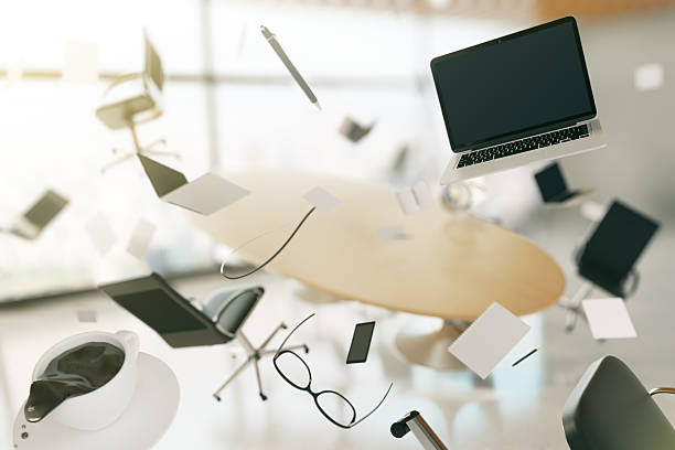 Concept of chaos in the office with flying objects