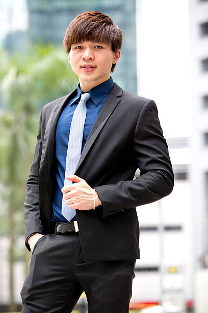 istock Young Asian male business executive smiling portrait 498141306
