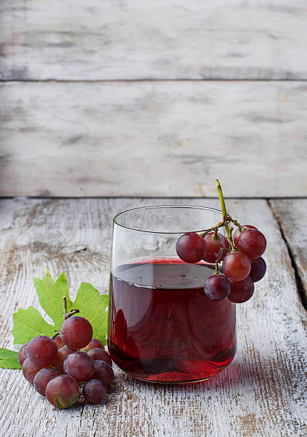 istock Glass of fresh grape juice 498141394