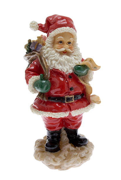 istock Santa Claus with wish list and backpack 498142424