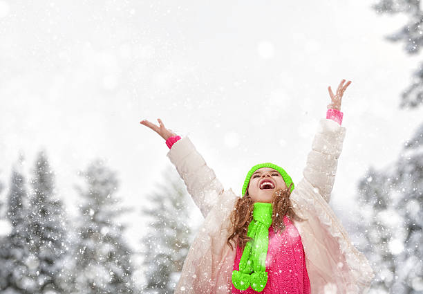istock girl playing on a winter walk 498144168