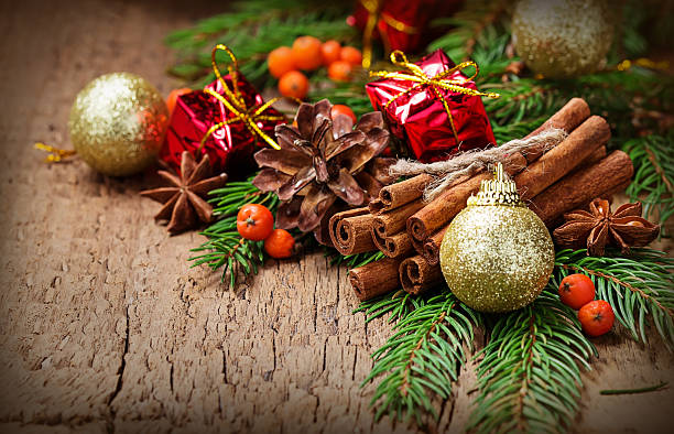 istock Christmas spices cinnamon sticks, star anise and green tree 498144604