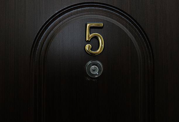 istock Number five and a peephole on the front door 498146026
