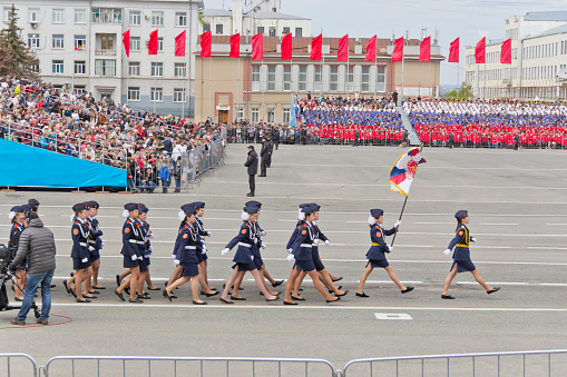 Samara, Russia - May 9, 2015: Russian woman midshipmans march at the parade on annual Victory Day