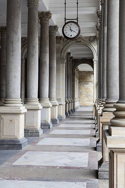 istock Old clock, and stone columns in Karlovy Vary, Czech Republic 498150896
