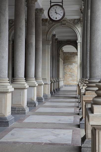 istock Old clock, and stone columns in Karlovy Vary, Czech Republic 498150972