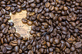 Map of Peru under a background of coffee beans