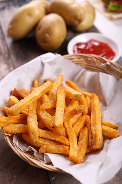 istock french fries with tomato sauce 498153040
