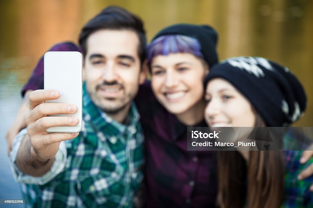 Group of friend taking "selfie" 2015 Stock Photo