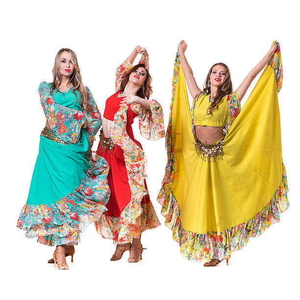 istock three female dancers posing, isolated on white in full length 498153934