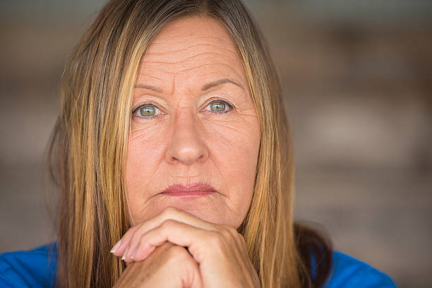 istock Thoughtful daydreaming woman portrait 498170674