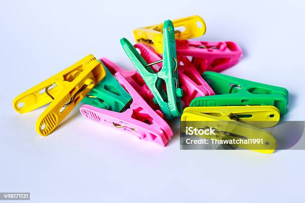 Green Yellow And Pink Clothes Peg Stock Photo - Download Image Now - Blue, Bundle, Circle