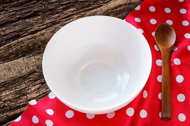 plate with a wooden spoon on the red napkin