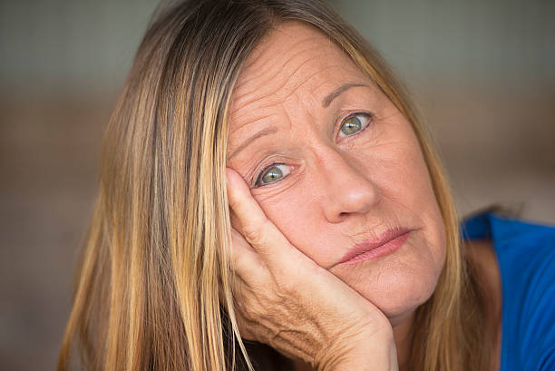 istock Portrait sad lonely depressed woman 498172452