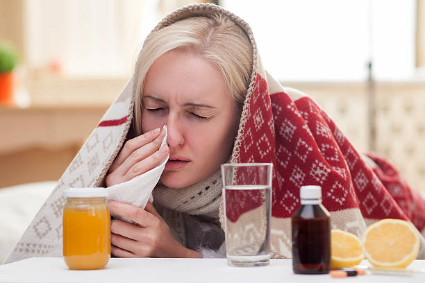 istock Ill young woman is suffering from flue 498172506
