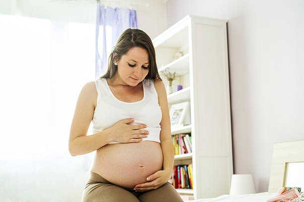 istock Pregnant woman at home 498173249