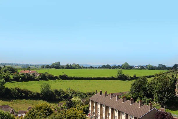 Countryside view with row of modern houses / rooftops, workers cottages