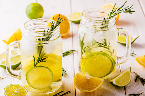 istock Homemade lemonade with lime, lemon, rosemary. 498173688