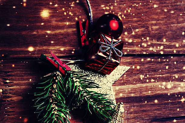 istock Christmas card with christmas rustic decorations on wooden backg 498174752