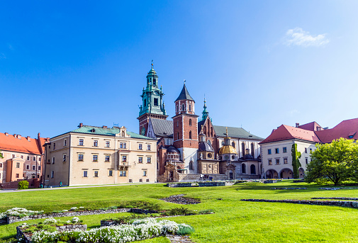 Wawel castle on sunny day with blue sky and white clouds, Krakow, Poland