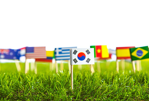 istock Paper cut of flags on grass 498175649