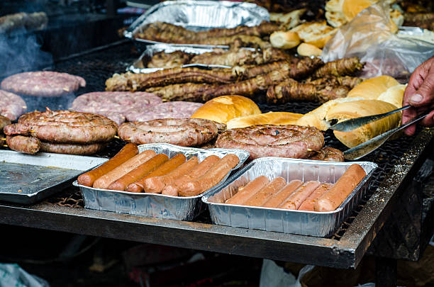 istock Typical Sardinian food. Sausages roast, bread, steaks roast, pig 498175892