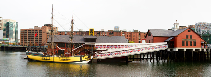 Boston, MA, USA - October 27, 2012 - Boston Tea Party Museum and replica wharf in Boston's harbor district