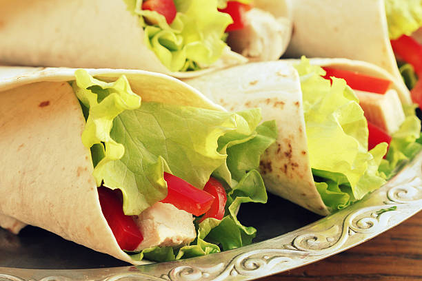 istock tortilla wraps with chicken and vegetables 498186360