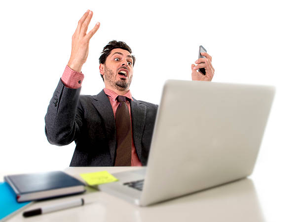 istock busy businessman working at office computer desk in stress overworked 498187026