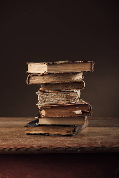istock Pile of ancient books 498188178