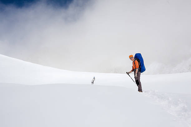 istock Hiker crosses Cho La pass in Khumbu valley, Nepal 498189692