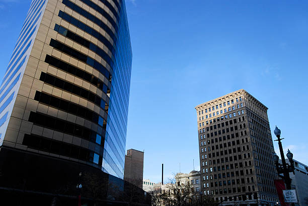 modern glass office building downtown skyscrapers