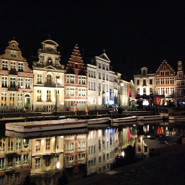 istock Building reflections at night in Antwerp, Belgium 498195650