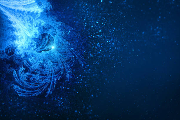 istock Frozen flower in the background of falling snow 498196592