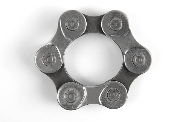 Closeup image of an old bicycle front chain ring sprocket .