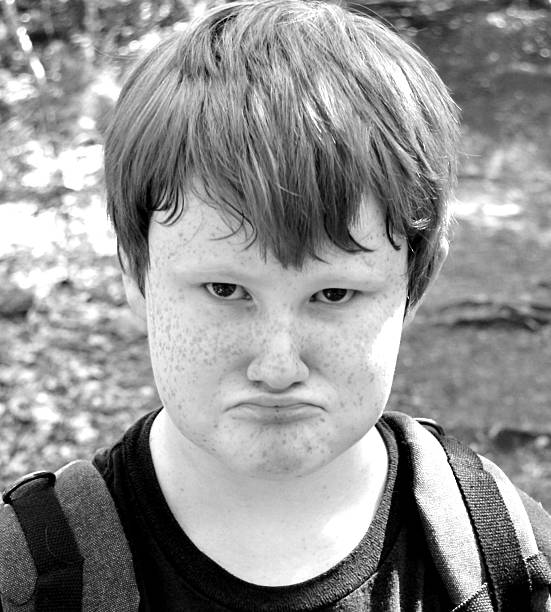 istock Portrait of Pouting Child in Black and White 498201580