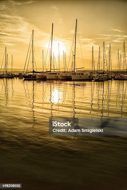 Foto de Barcos À Vela No Pôr Do Sol e mais fotos de stock de Mar - Mar, Amarelo, Ancorado