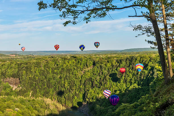 Flying Down The Gorge At Letchworth State Park Hot Air Balloons Flying Down The Gorge At Letchworth State Park In New York letchworth state park stock pictures, royalty-free photos & images