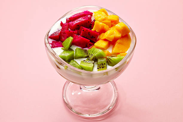 istock fruit and ice creamy dessert on pink 498211213