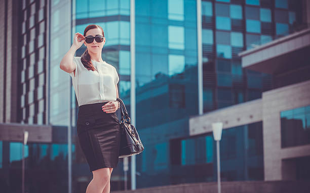 istock woman walking in the city 498211337