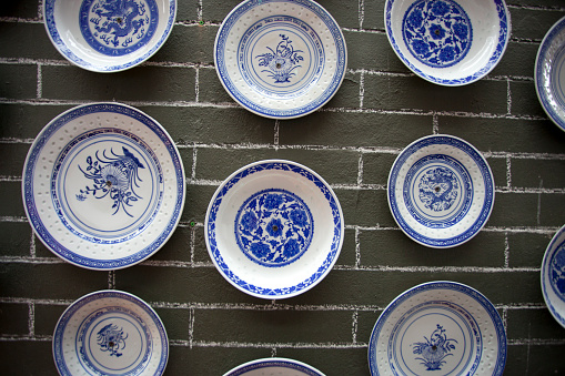 Chinese vintage wall design with porcelain plate