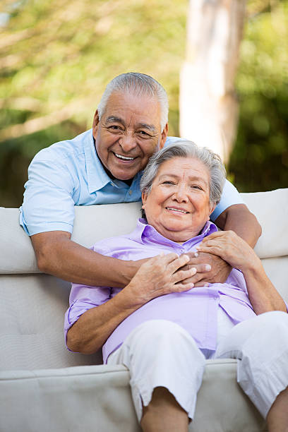 istock Senior husband hugging wife 498238539