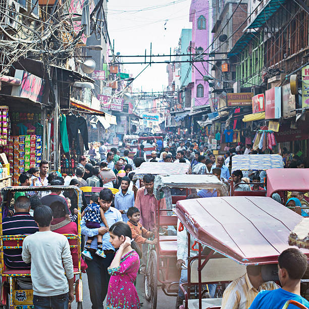 Busy Old Delhi Busy streets in New Delhi - India. bazaar market photos stock pictures, royalty-free photos & images
