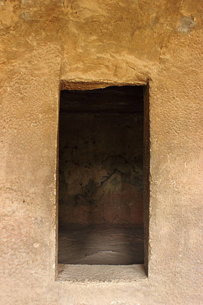 istock Ancient stone carved gate in elephanta caves, Mumbai, India 498238681