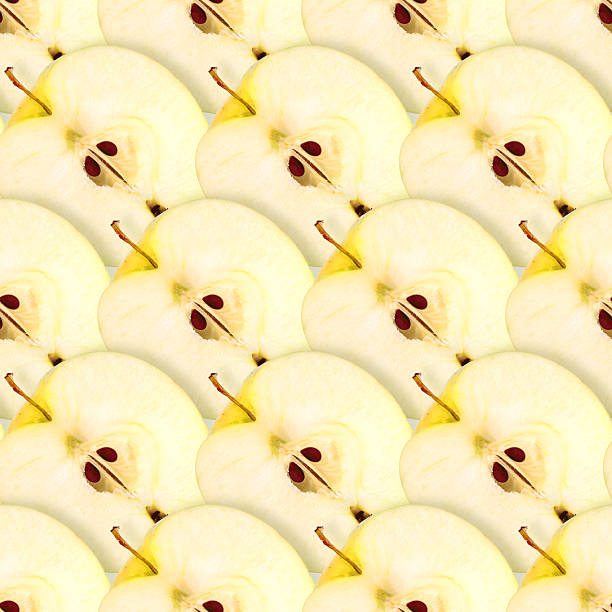 istock Seamless pattern of slices yellow apple 498243341