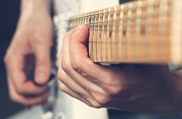 istock Guitarist playing an electric guitar 498243471