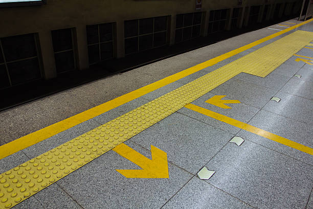 arrow in the subway station arrow on the road,subway station gap toothed stock pictures, royalty-free photos & images