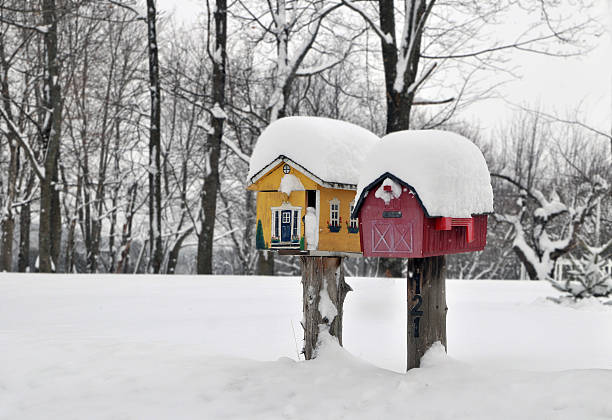 Mailboxes under the snow. Photo taken after a snow storm in the Eastern Townships, Quebec.