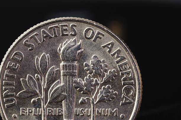 istock US American coin on black background 498250610