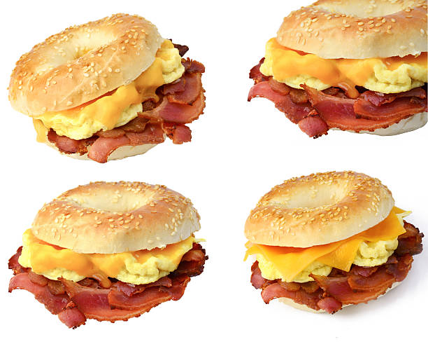 Bagel bacon, egg and cheese sandwich Set of 4 various images of breakfast bagel sandwich with omelet, bacon and cheddar cheese, isolated breakfast sandwhich stock pictures, royalty-free photos & images